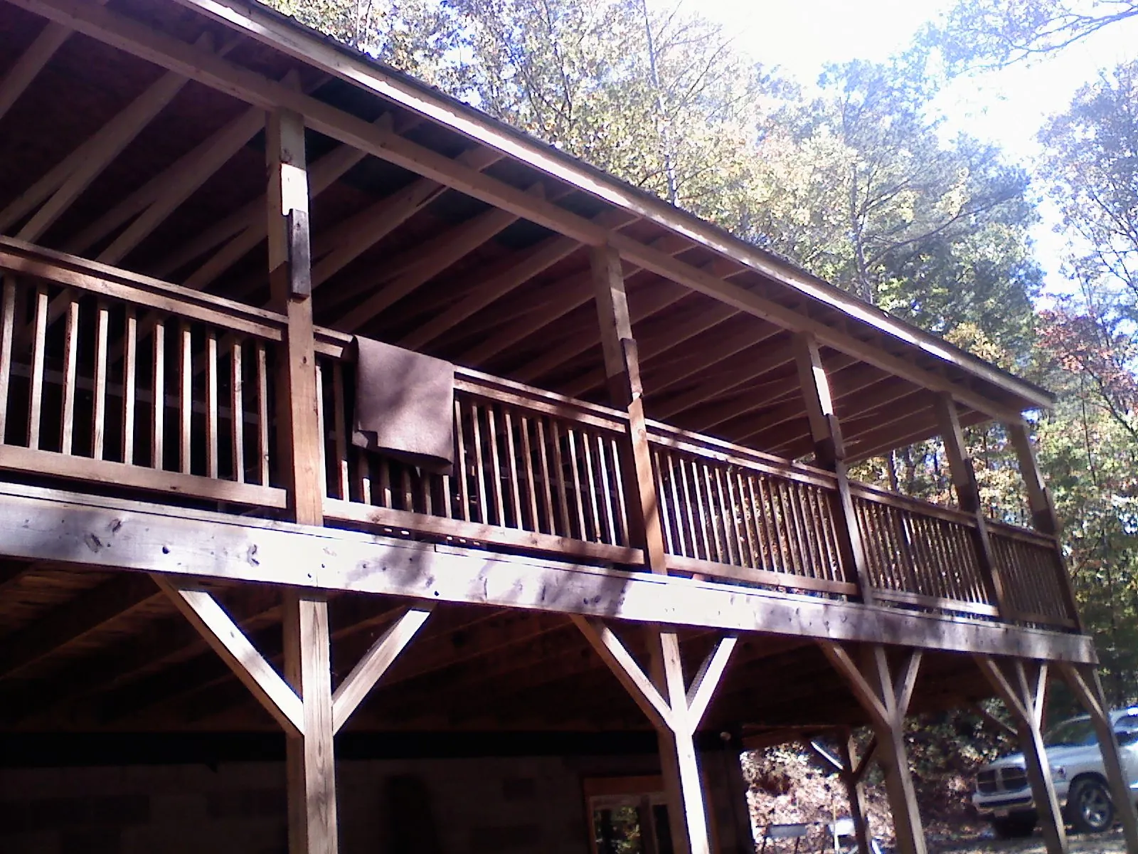 Timber framing under a new elevated porch and deck — Roof Leak Repair in Suwanee by Roofing Brothers